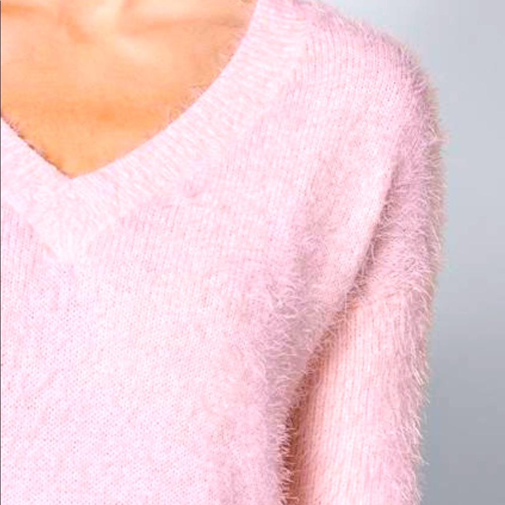 Soft,fuzzy, pink sweater